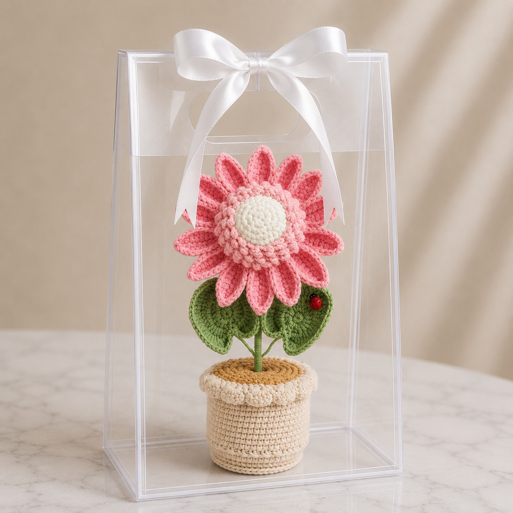 Handmade crochet sunflower in pot with clear gift box and white ribbon bow